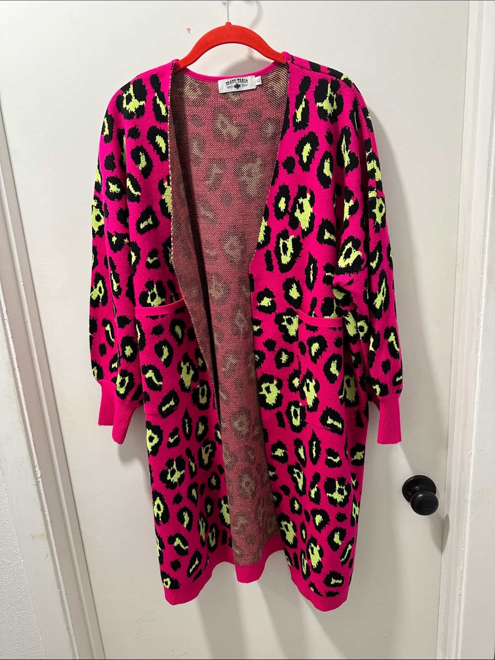 Long open front cardigan.